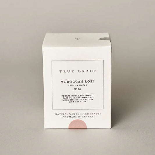True Grace Moroccan rose classic candle in printed glass packaging, part of the Village Range, made with renewable wax.