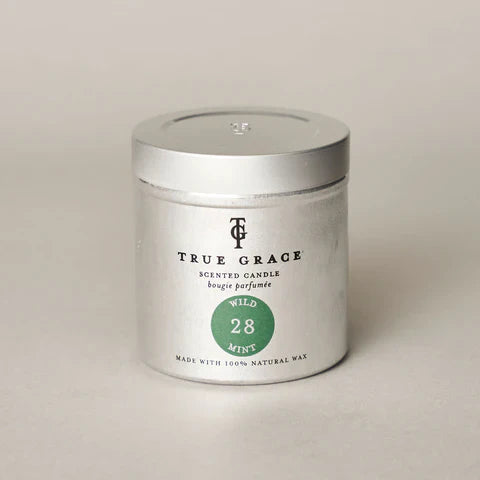 True Grace Wild Mint Tin Candle with notes of spearmint, basil, and lemon.