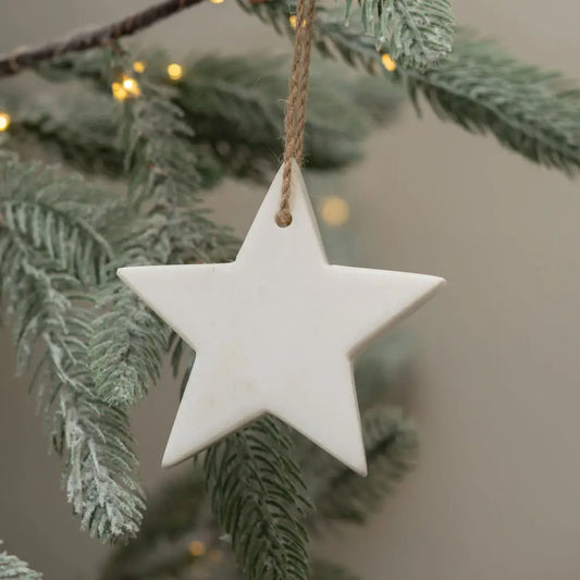 White marble star decoration, handcrafted for subtle elegance and a stylish home accent.