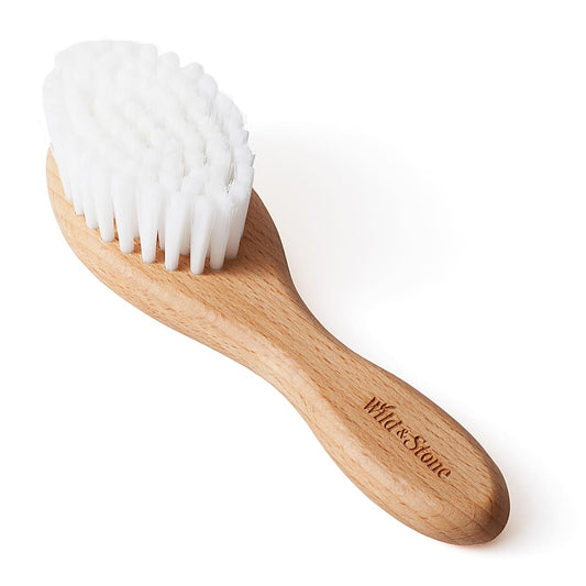 Gently smooth and detangle baby hair with our natural bristle brush. Safe for delicate scalps—perfect for daily grooming and healthy, happy hair.