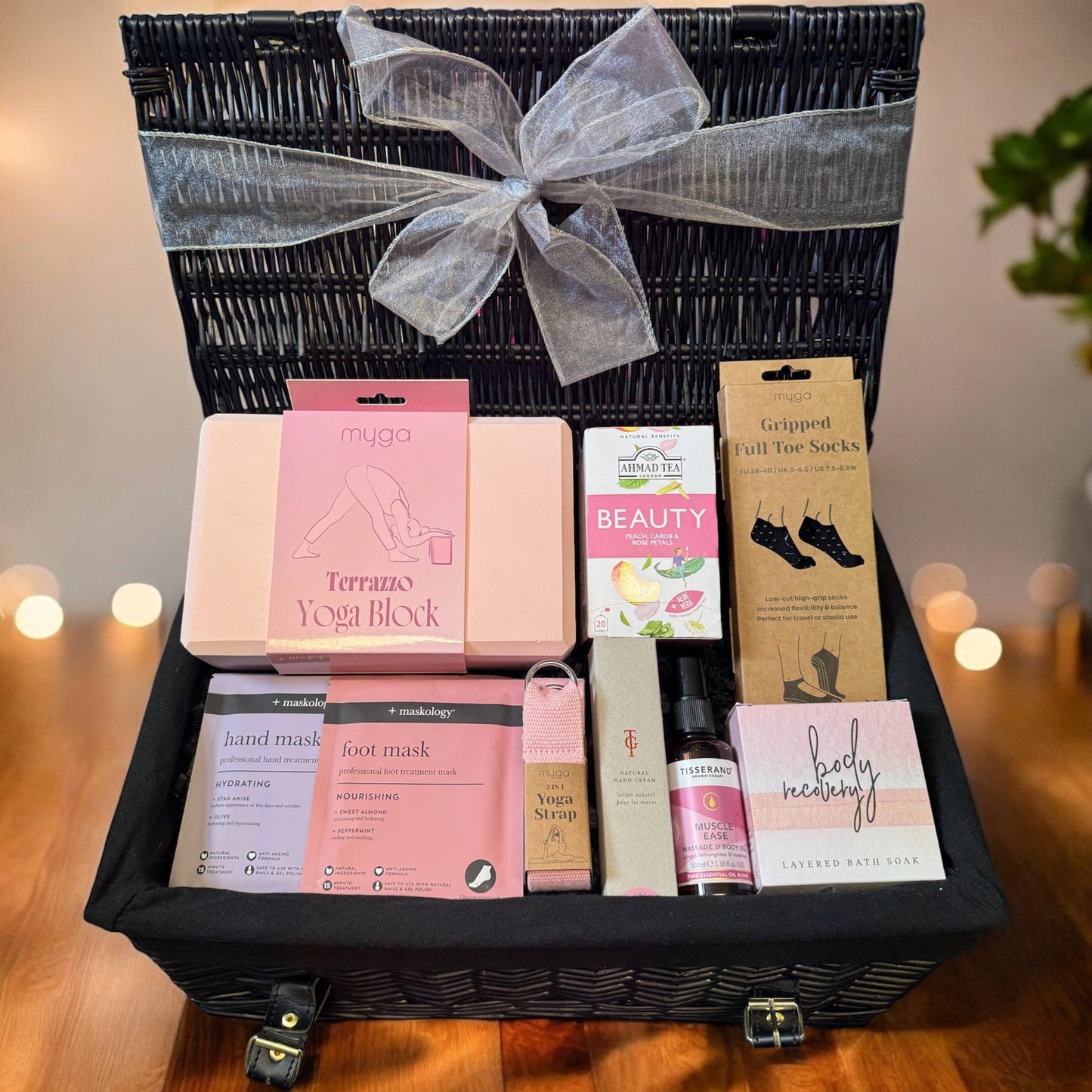 Yoga Lover gift hamper with yoga block, grippy socks, yoga strap, beauty blend teabags, foot and hand masks.