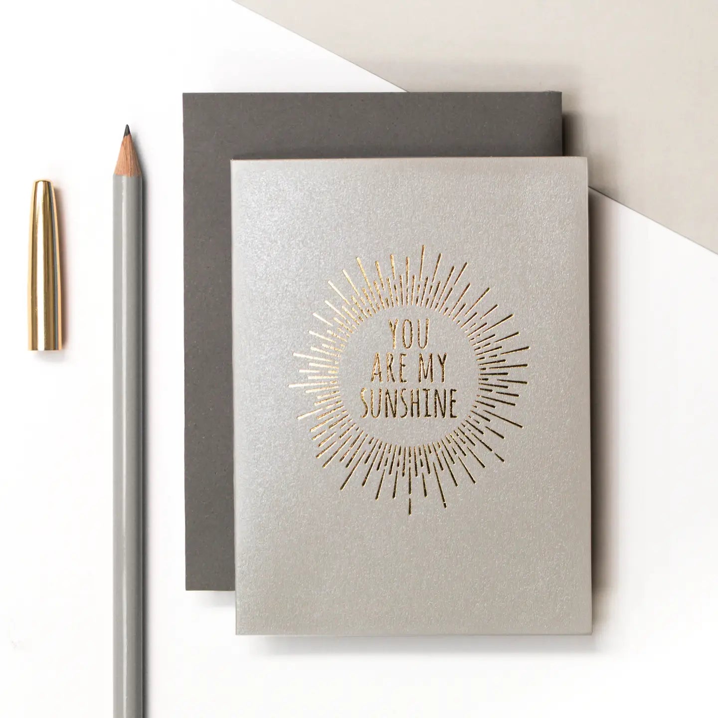 You Are My Sunshine mini foiled greeting card with sunburst design and heartfelt message.