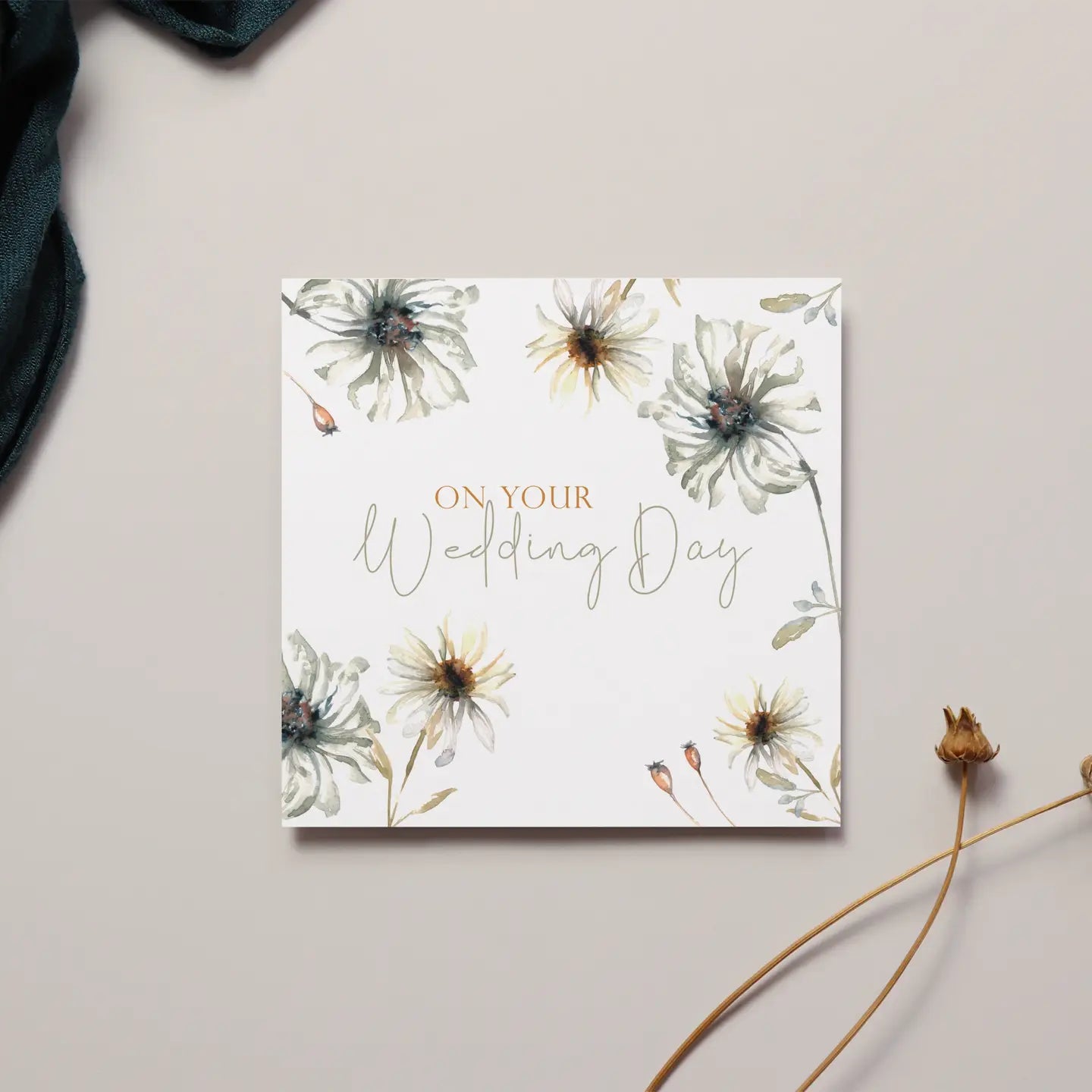 Elegant floral "On Your Wedding Day" card with delicate flower design.