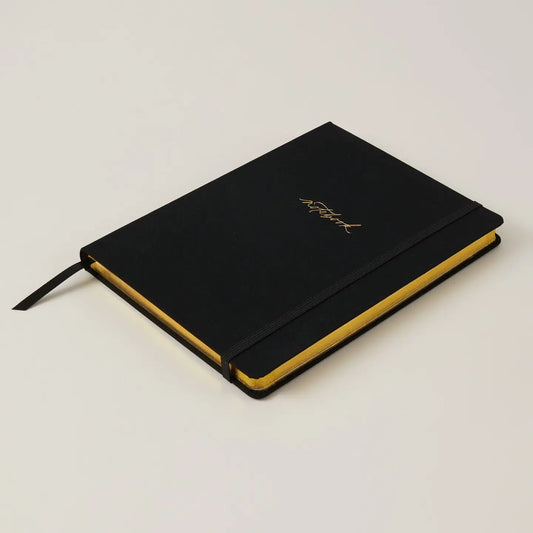 Luxury black notebook with a sleek design and quality paper.