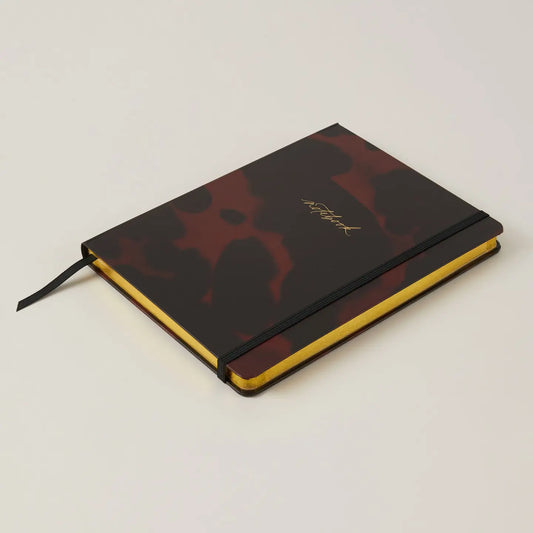 Luxury Notebook in Tortoise design, compact and stylish for modern gentlemen.