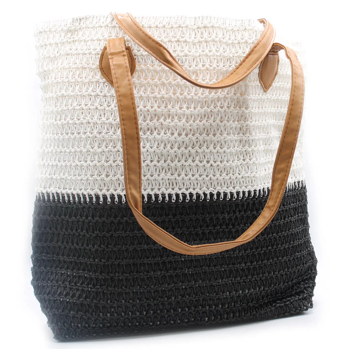 Back to the Bazaar Bag in black and white with brown shoulder straps.