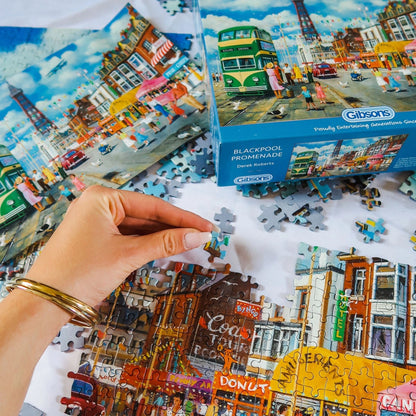 1000-piece Blackpool jigsaw puzzle illustrated by Derek Roberts showing Blackpool Tower, trams and lively seaside scenes.