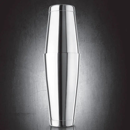 Silver cocktail shaker on a dark textured background