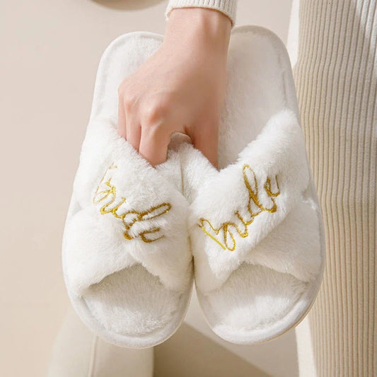 Soft white cross strap indoor bride slippers with gold embroidery.