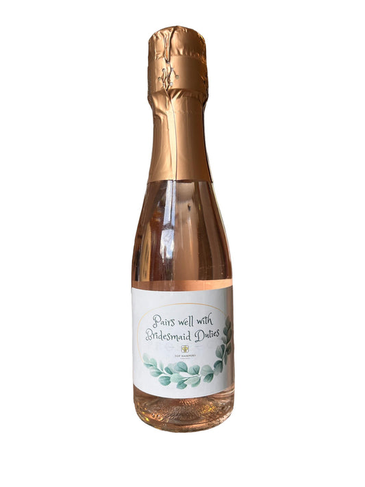 Bridesmaid Rose Prosecco mini bottle with gold foil and decorative label.