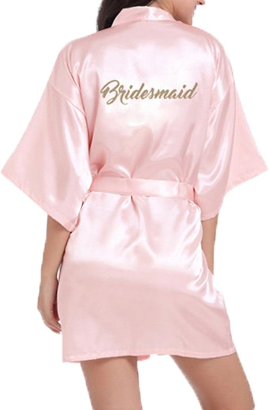 Pink satin bridesmaid robe with "Bridesmaid" embroidered on the back.