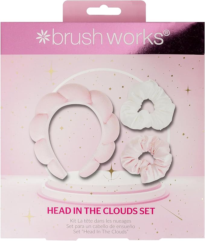 Packaging of 'Head in the Clouds' set by brush works with pink headband and scrunchies.