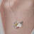 Butterfly and Daisy Necklace in Sterling Silver & Goldplate