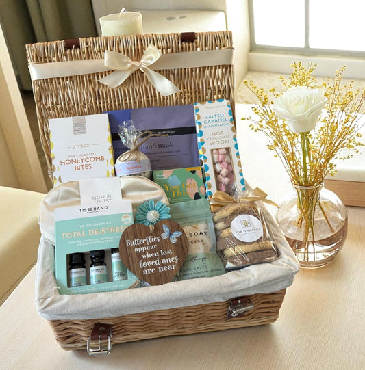 Calm & Comfort Hamper with chocolate, cookies, hot chocolate, bath salts, hand mask, and de-stress kit – thoughtful sympathy gift.