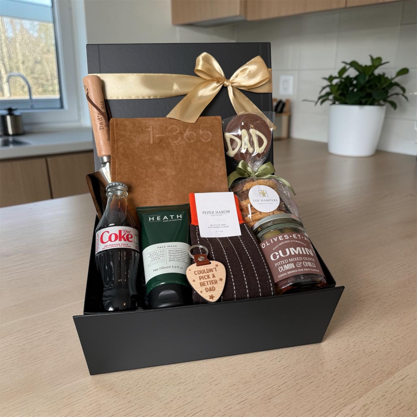 Cheers Dad gift box with journal, chocolate lollipop, socks, olives, biscuits, keyring and choice of beer, wine or soft drink.