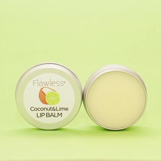 Coconut and Lime Lip Balm in open tin container on green background.