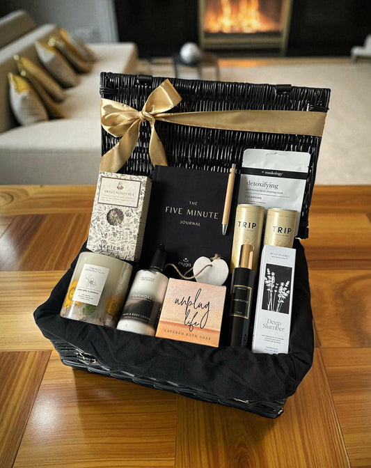 thoughtful and caring gift hamper with self care items, five minute journal, deep slumber pillow spray, mindful drinks, sweet sleeps tea and more