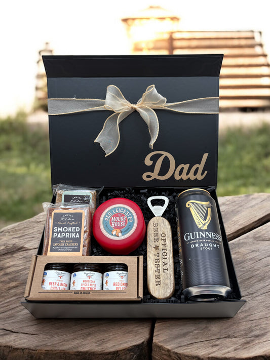 dad gift box with artisan cheese, crackers, chutneys, and chocolate cashews.