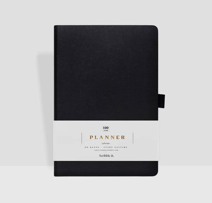 premium Black daily productive planner with white label on a light background