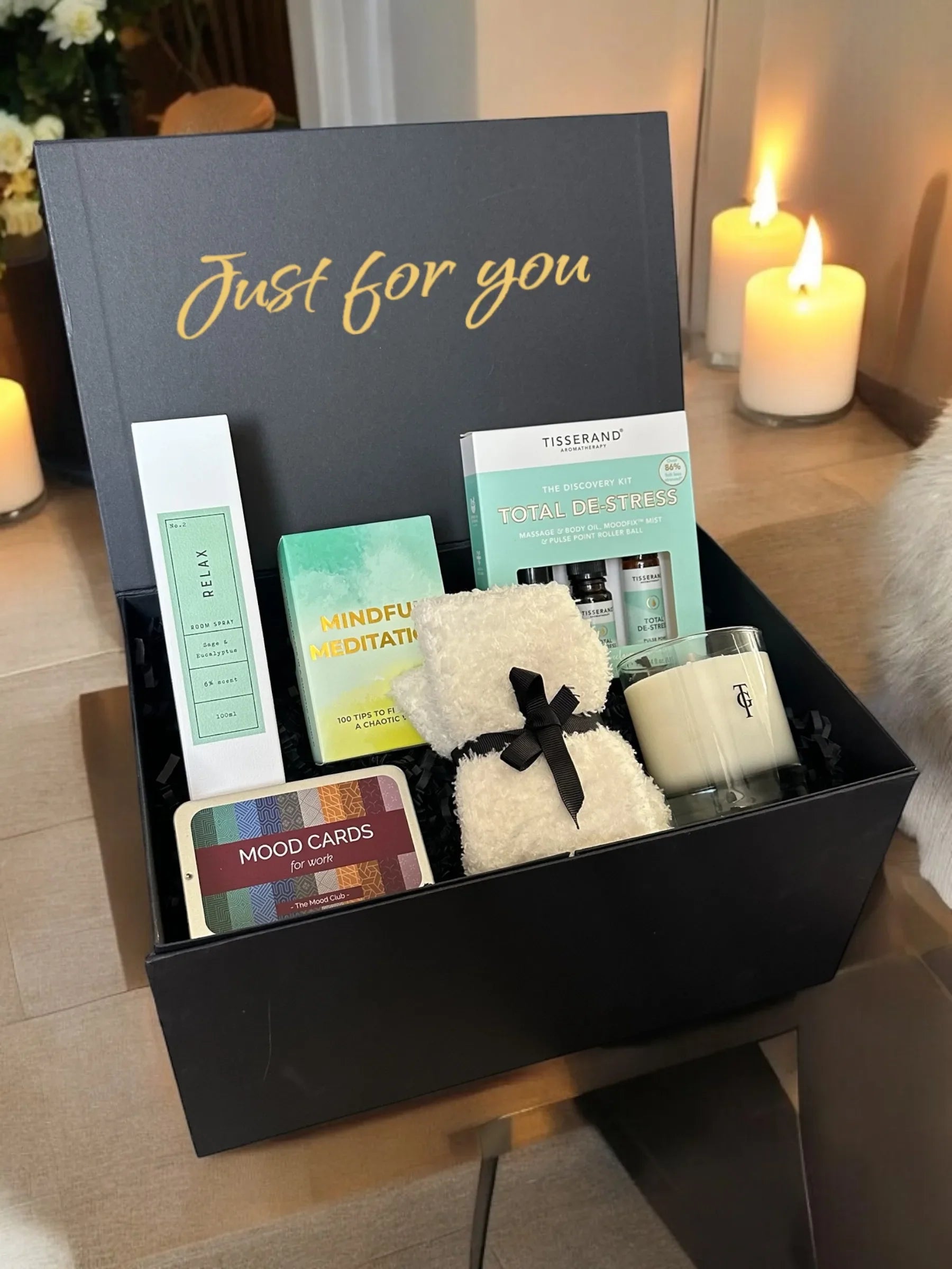 Mindfulness Gift Box with meditation cards, stress oils, scented candle, mood cards, fluffy socks, and room spray.