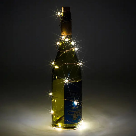 Decorative bottle lights with cool white LED on wine bottle.