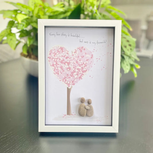 Love themed pebble artwork in deep edge frame, depicting romantic scene.