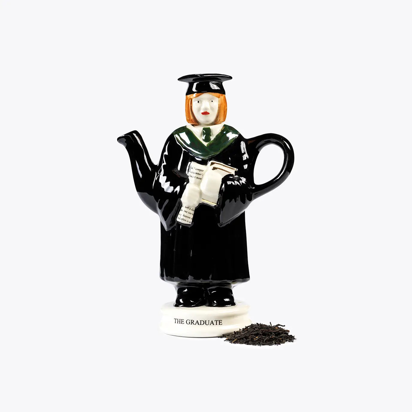 Handmade collectible teapot figurine of a female graduate, ideal gift for graduates.