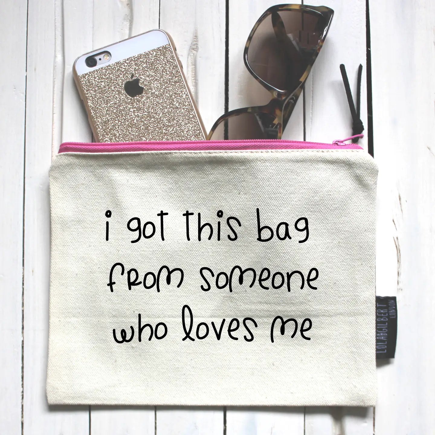 Stylish "I Got This Bag From Someone Who Loves Me" makeup pouch with zipper, hand-screen printed.
