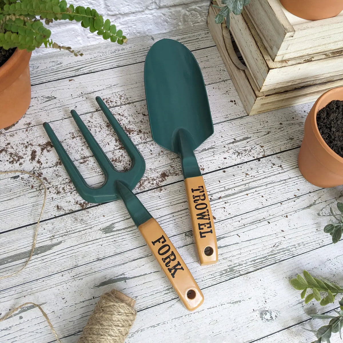 Garden fork and trowel set with sturdy ergonomic handles and a two-tone finish, presented on a gift-ready header card.