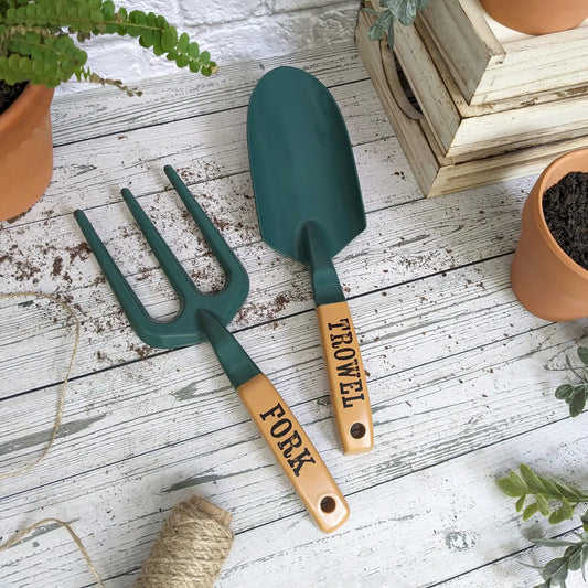 Garden fork and trowel set with sturdy ergonomic handles and a two-tone finish, presented on a gift-ready header card.