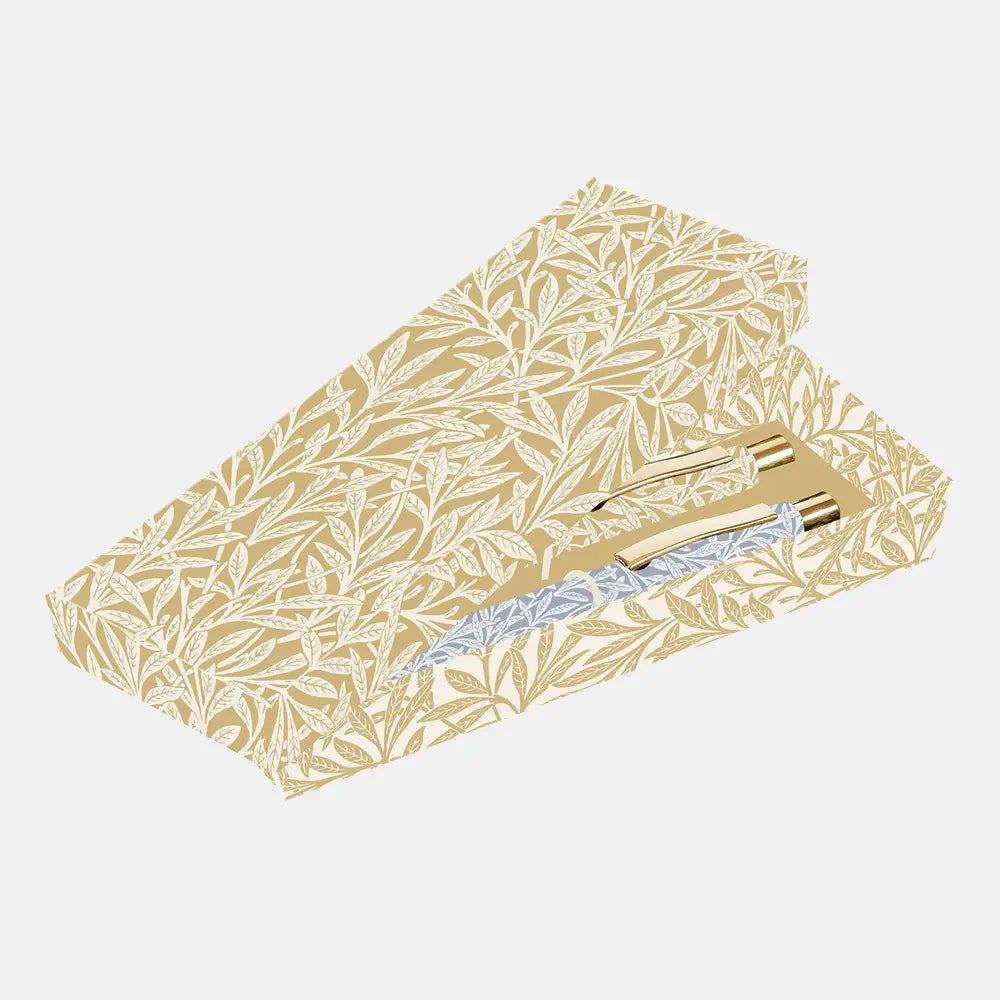 Floral-patterned pen case with pens on a light gray background
