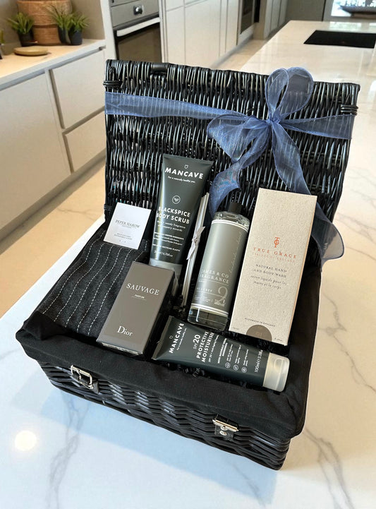 male grooming and fragrance luxury gift with premium socks, self care items, dior sauvage aftershave and scented diffuser