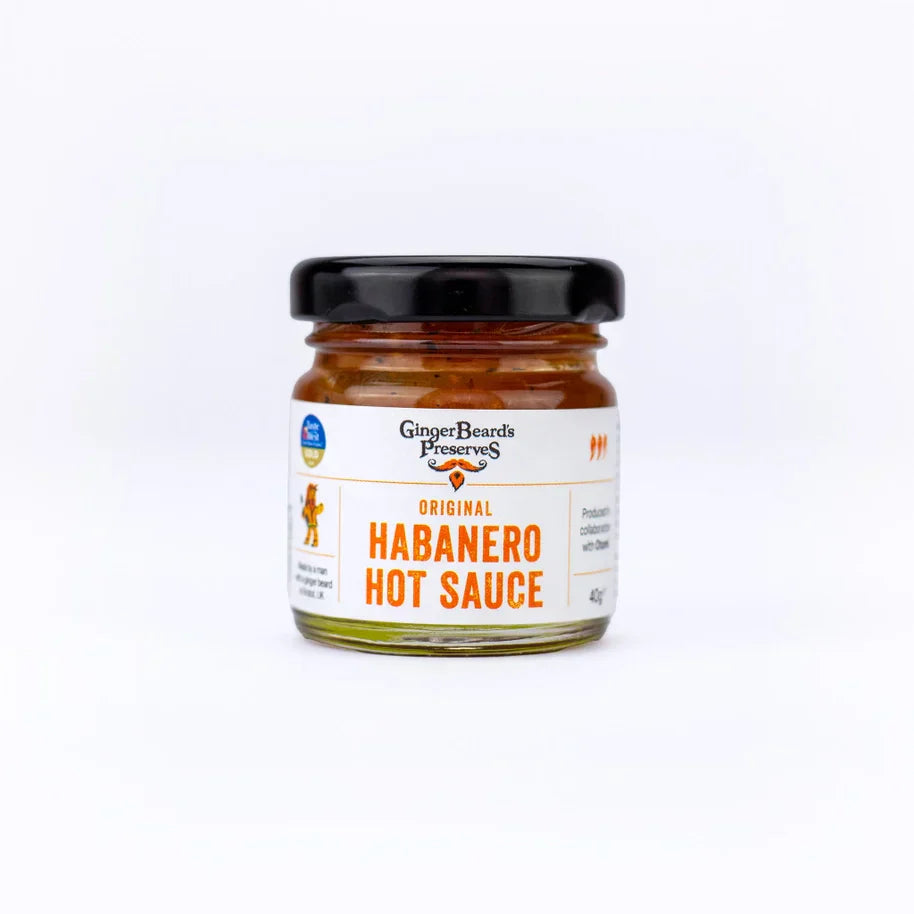 Miniatures - Habanero Hot Sauce in a glass jar with a fiery and flavorful condiment label.
