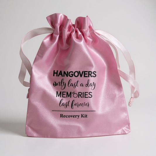 Pink satin hangover recovery kit bag with slogan “Hangovers only last a day, memories last forever” – ideal party or hen do favour.
