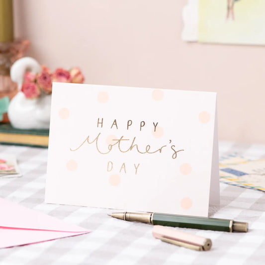 Happy Mother's Day card with gold foil text and peach polka dots.
