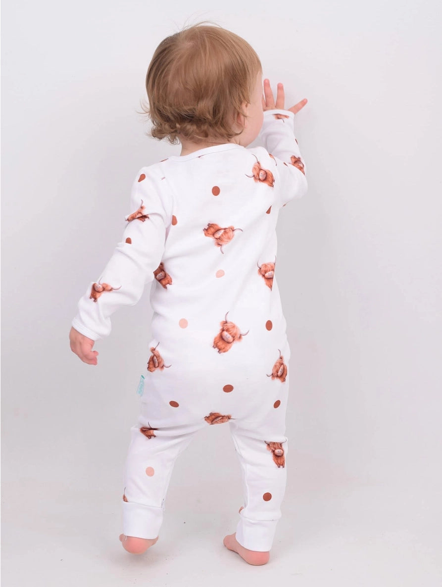 Organic cotton baby sleepsuits, soft and cosy, designed for comfort and everyday wear for little ones.