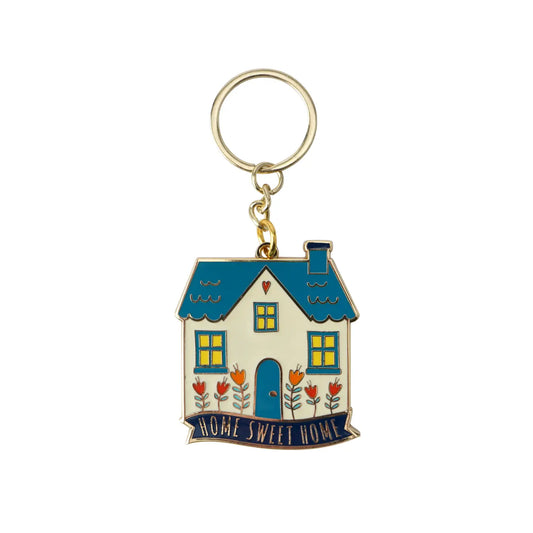 Home Sweet Home enamel key ring shaped like a house with colorful details.