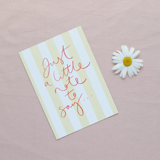 Just A Little Note postcard with deckchair stripe design and daisy flower.