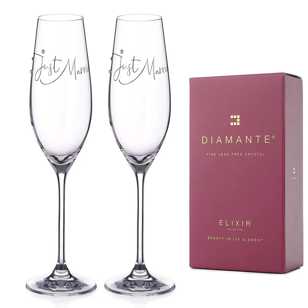Elegant champagne glasses with platinum detail and Swarovski crystals, ideal for weddings and celebrations.