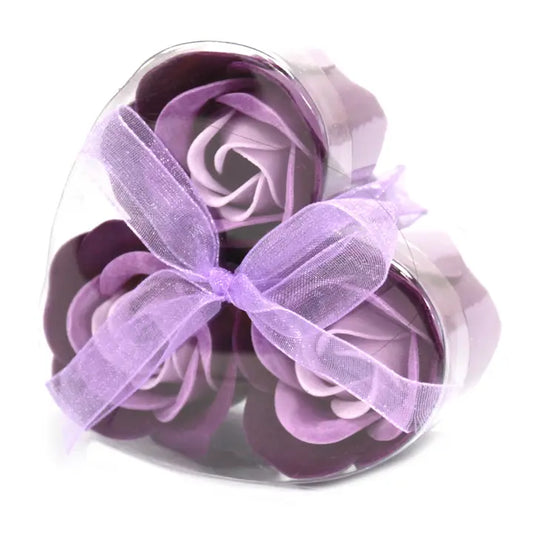 Set of 3 lavender soap roses in heart-shaped box with purple ribbon.