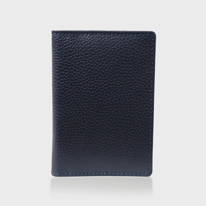 Pebble Grain Leather Passport Holder in Navy, stylish travel accessory.