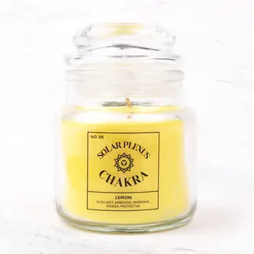 Seven Chakra Candle - Solar Plexus with lemon scent in glass jar, boosts confidence and personal power.