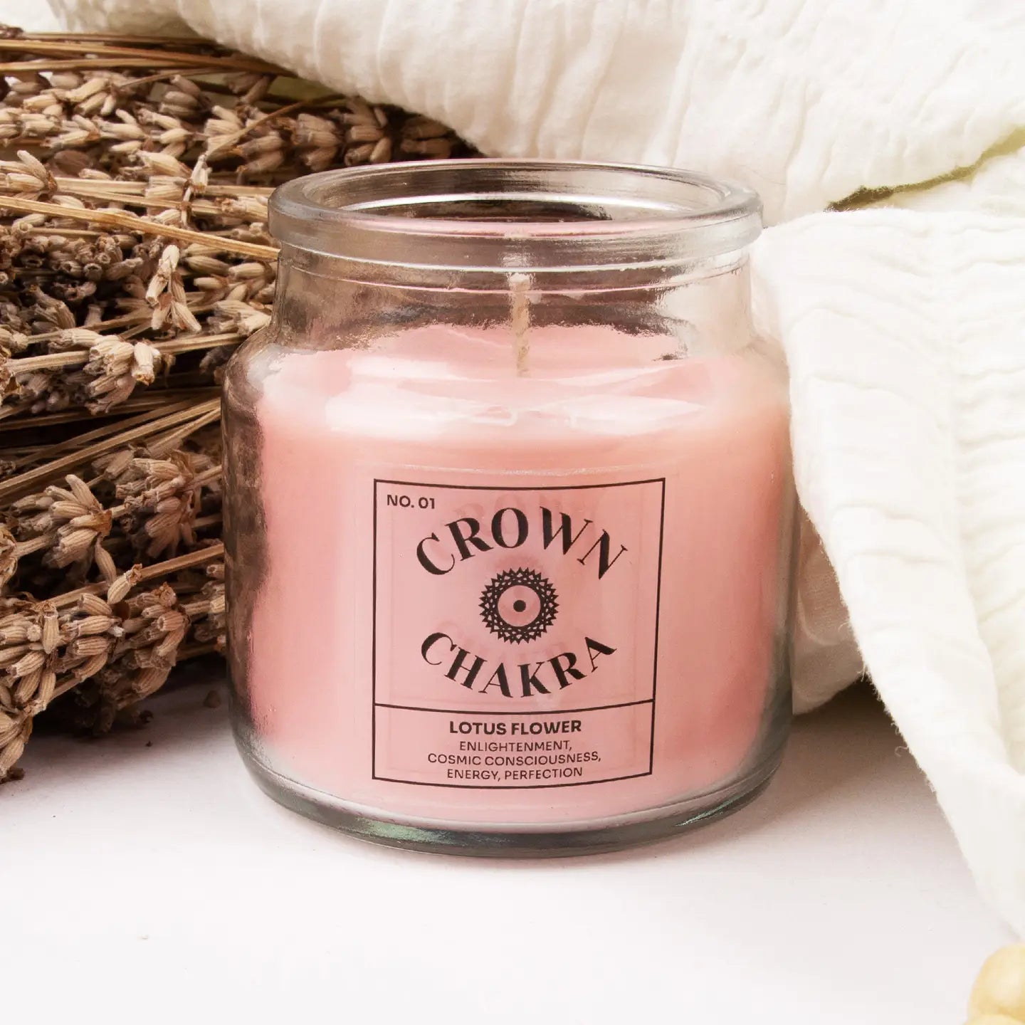 Seven Chakra Candle with lotus scent for Crown Chakra, promoting spiritual connection and relaxation in meditation settings.