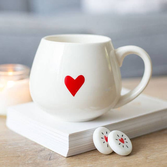 Charming heart design mug with hidden "Love You" message.