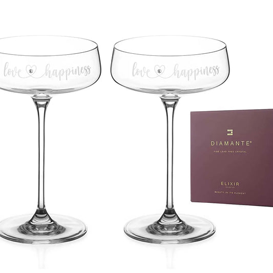 love and happiness champagne saucers with elegant gold detail.