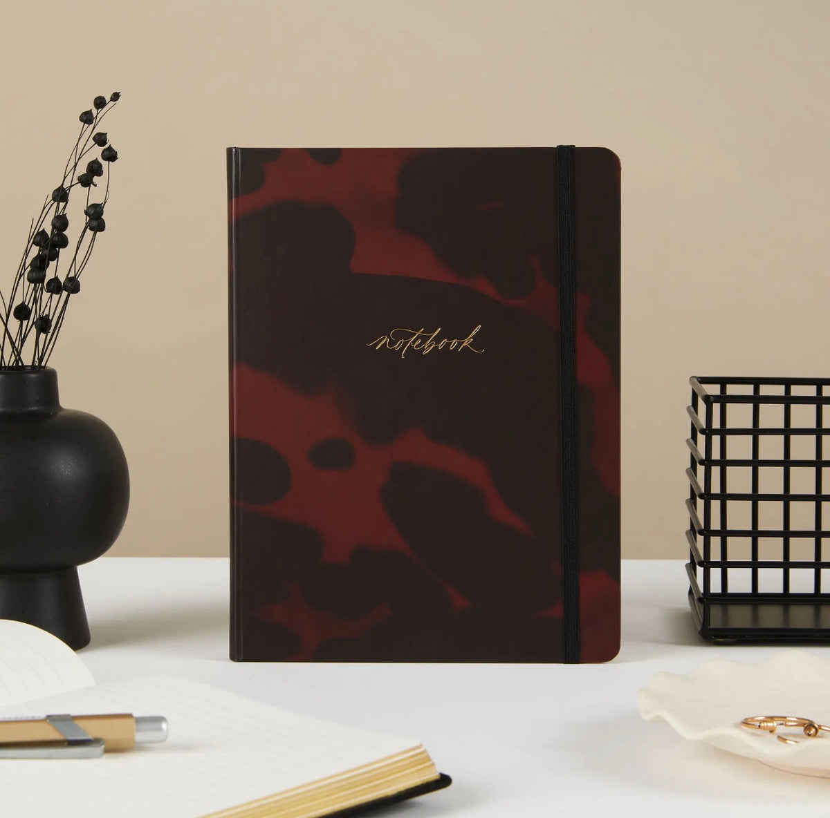 A luxury tortoiseshell notebook with gold foil and gilt edges. A stylish gift for stationery lovers, new jobs, birthdays and thank yous.