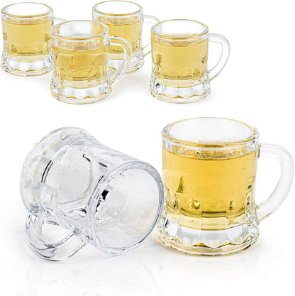 Mini beer mug shot glasses filled with light golden liquid.