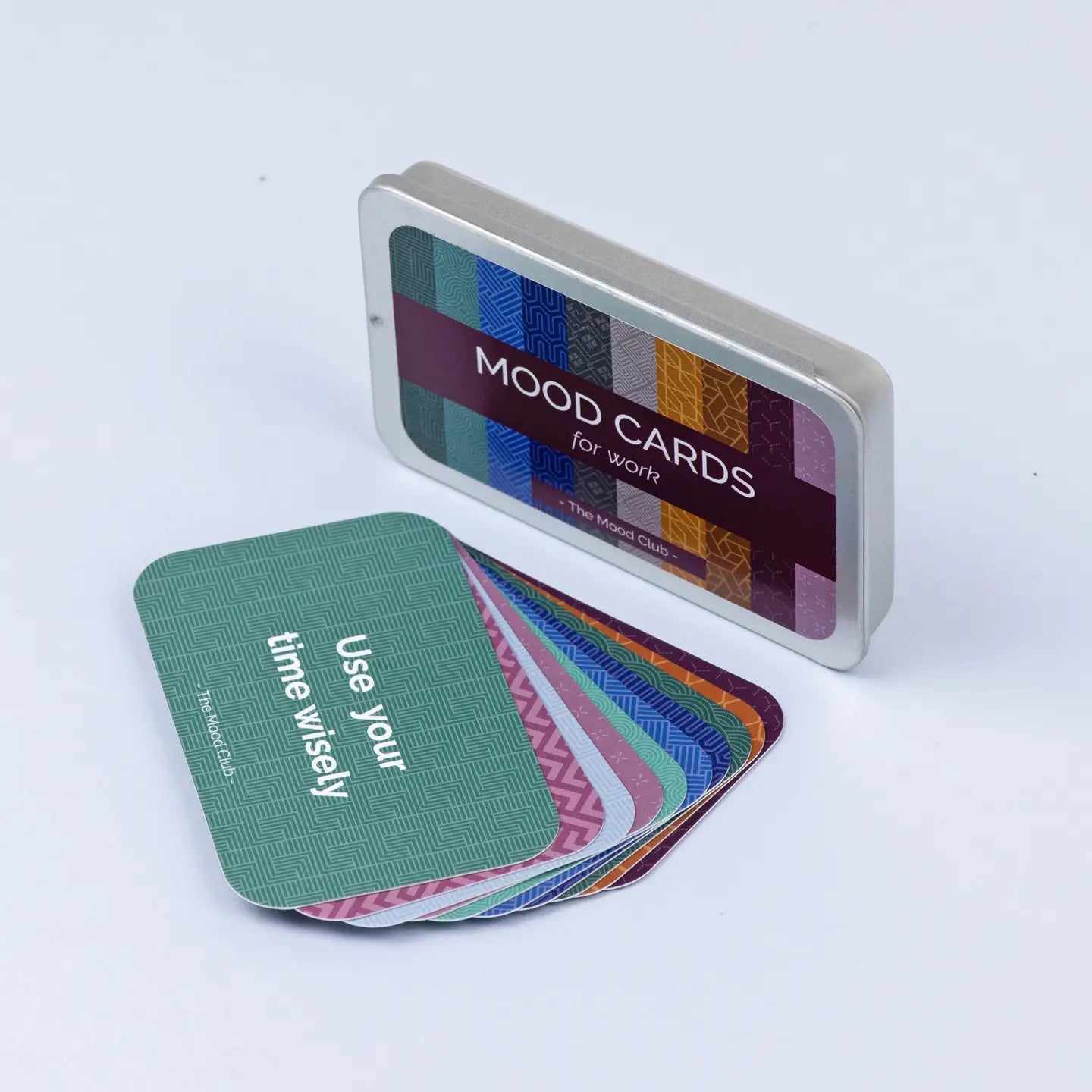 Positive affirmation mood cards for work in a colorful tin.