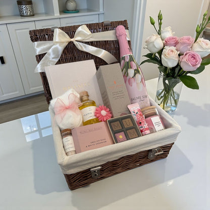 Mother’s Day luxury hamper with self-care items, wellness treats and soft pink accents, beautifully presented for Mum
