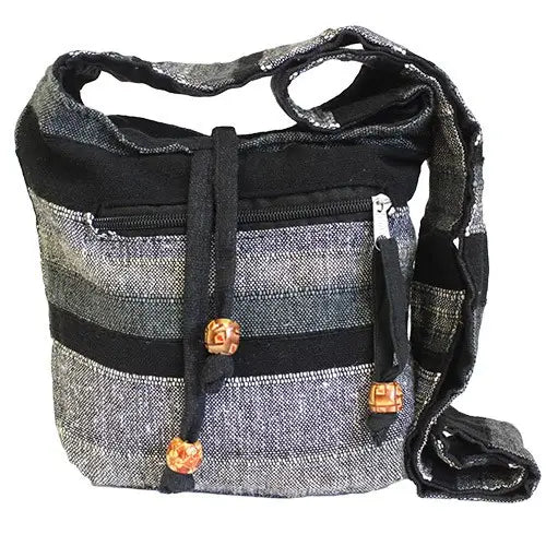 Nepal Sling Bag with wide shoulder strap and outside pockets in Mountain Granite design.